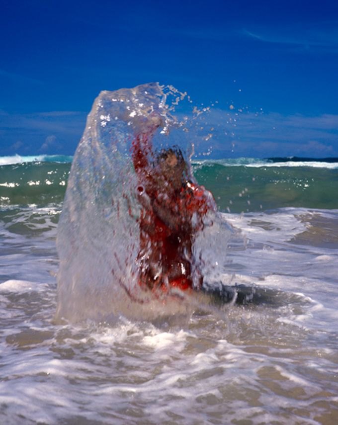 After Conversation: a later water work, the figure in red breaking through a wave