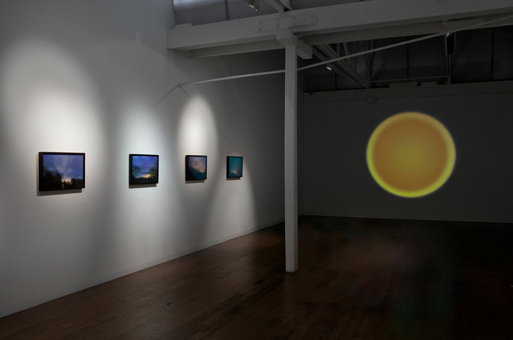 glide, installation view, 150 cm diameter, DV projection, 6 min 30 sec, edition of 5