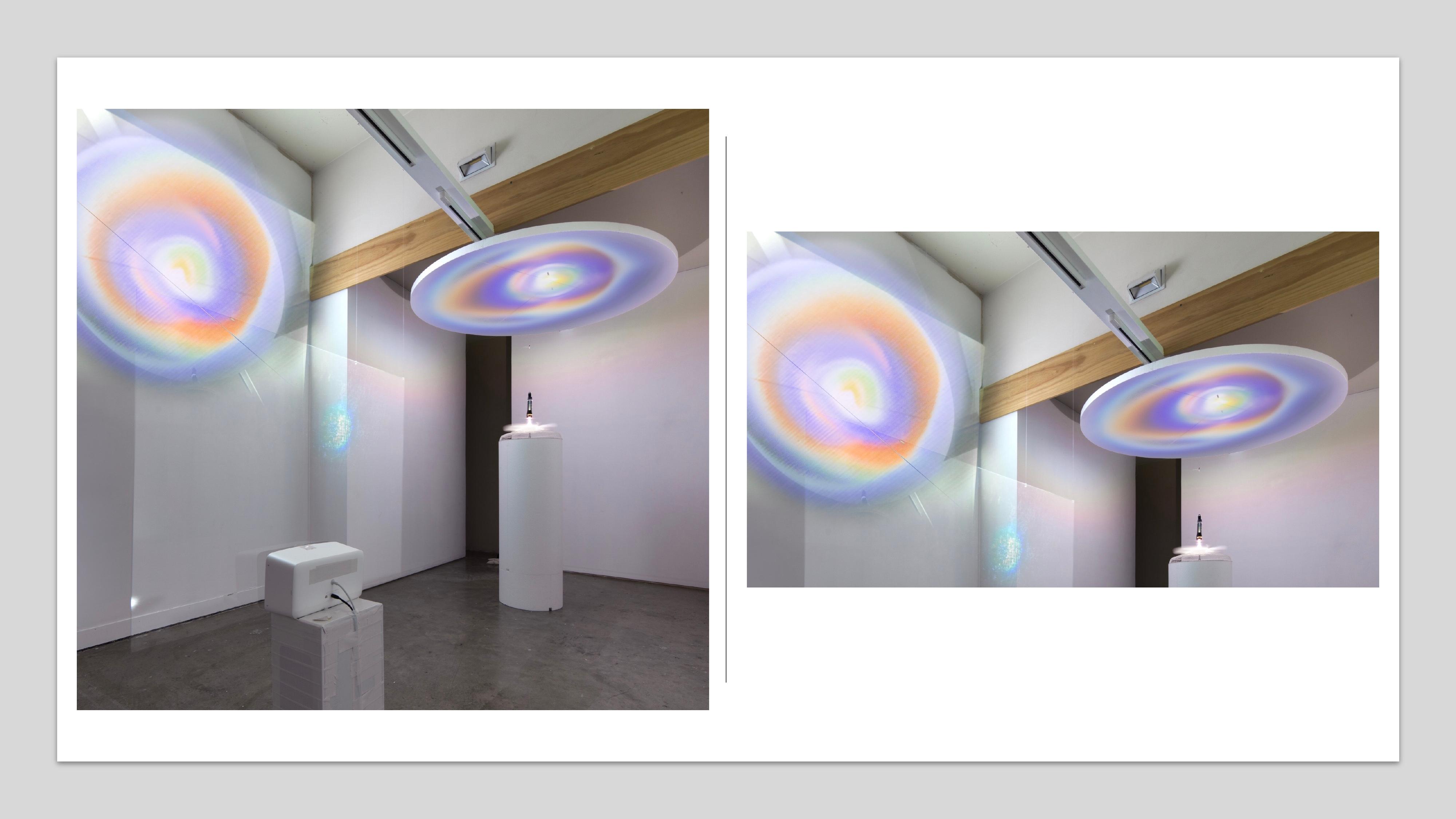 Close-up view of multicolored circular light patterns on polystyrene screen